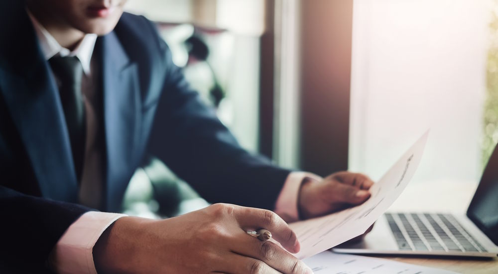 business man reading document